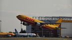 DHL plane taking off in front of Leipzig/Halle Hub