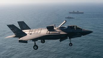 Fighter jets join forces with British aircraft carrier to make history