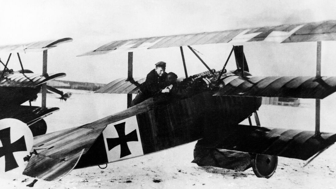 Manfred von Richthofen - Aviator, Germany - Richthofen and his airplane (Fokker triplane) DR-1) during WWI - 1918