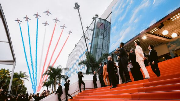 Patrouille de France paid tribute to Tom Cruise by flying over the red carpet before the Official Selection Premiere at 75th Annual Cannes Film Festival