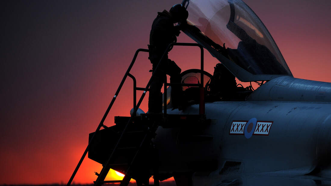 RAF Typhoon Pilot Climbs into the Cockpit Before a Mission Over Libya