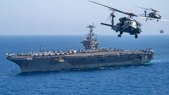 USS Truman auf See mit Hubschraubern